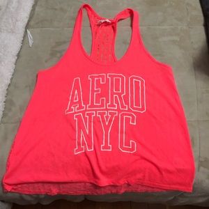 Neon pink distressed back tank